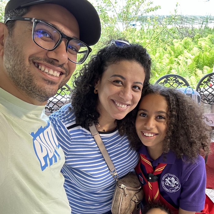 Ereeny with her family outdoors