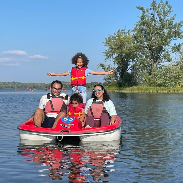 Ereeny with her family on the water